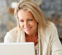 photodune-214673-happy-middle-aged-woman-using-laptop-s